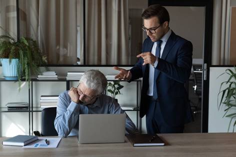 Man upset at older man at work - Employment Law